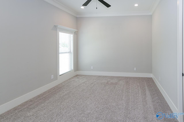 carpeted spare room with ornamental molding, recessed lighting, and baseboards