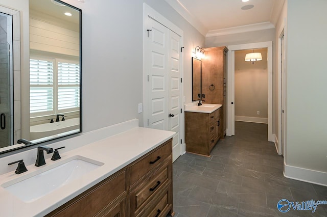 full bathroom with two vanities, ornamental molding, a sink, a shower stall, and baseboards