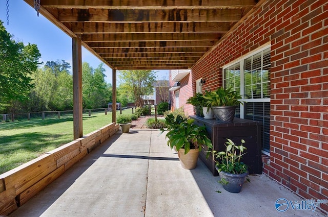 view of patio with fence
