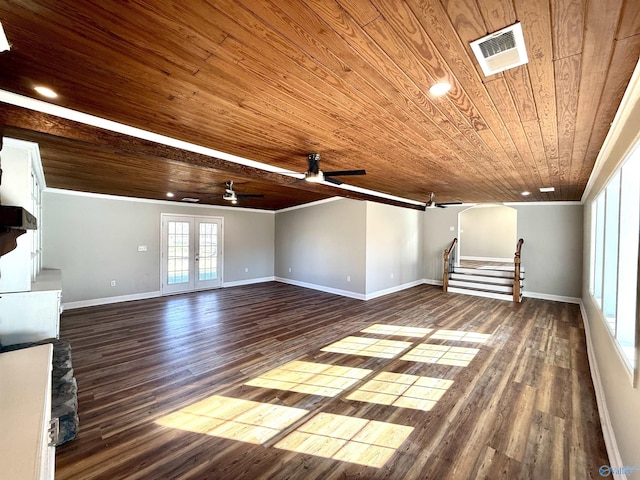 unfurnished living room with dark wood-style flooring, wood ceiling, visible vents, stairs, and french doors