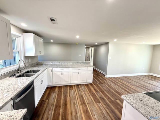 kitchen with recessed lighting, a sink, visible vents, white cabinets, and dishwasher