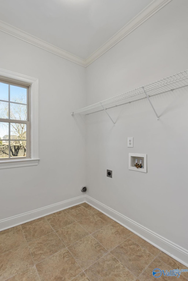 laundry area featuring crown molding, baseboards, washer hookup, laundry area, and hookup for an electric dryer