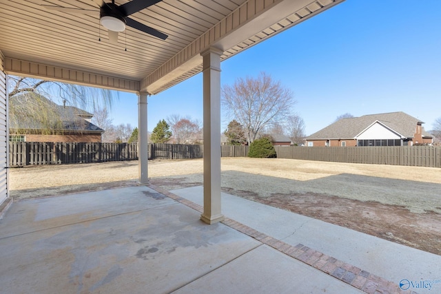 view of patio featuring a fenced backyard and a ceiling fan