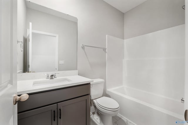 full bathroom featuring vanity, bathing tub / shower combination, and toilet