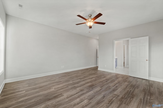 unfurnished bedroom featuring hardwood / wood-style flooring and ceiling fan