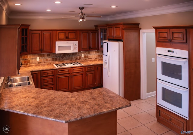 kitchen with white appliances, crown molding, sink, ceiling fan, and light tile patterned floors