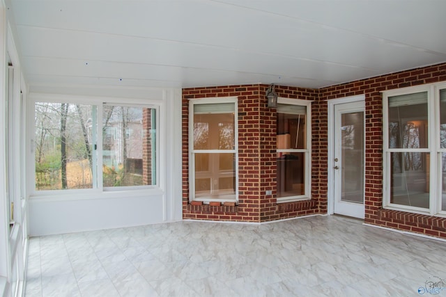 view of unfurnished sunroom