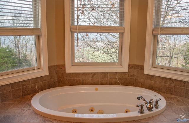 bathroom featuring a bath