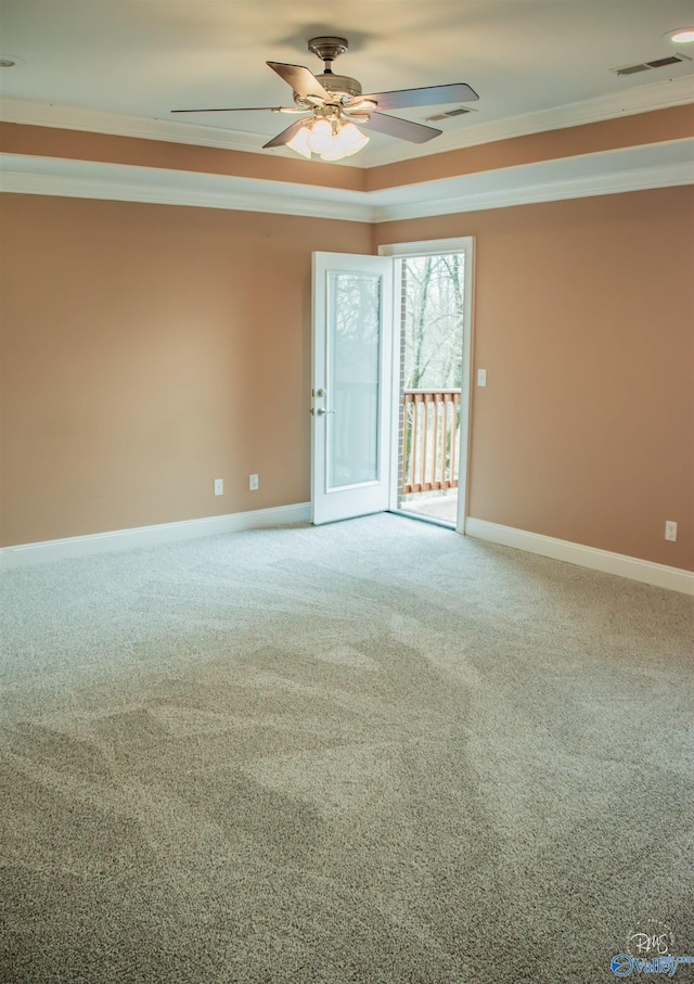 empty room featuring ceiling fan, french doors, carpet, and ornamental molding