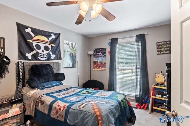 bedroom featuring ceiling fan and carpet floors