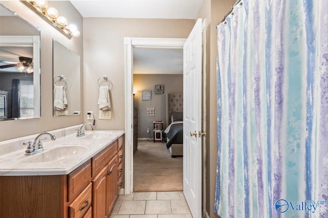 bathroom featuring vanity, ceiling fan, and tile patterned floors