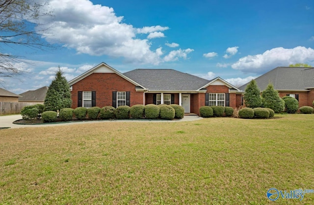 26560 Mill Creek Dr, Athens, AL 35613 - view of front of property with brick siding, roof with shingles, and a front lawn
