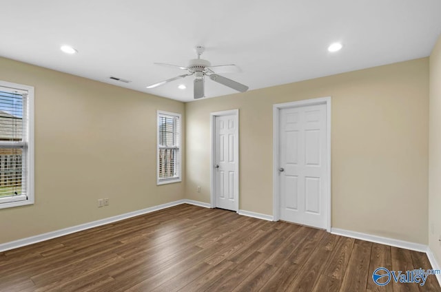 26560 Mill Creek Dr, Athens, AL 35613 - unfurnished bedroom with wood finished floors, recessed lighting, baseboards, and visible vents