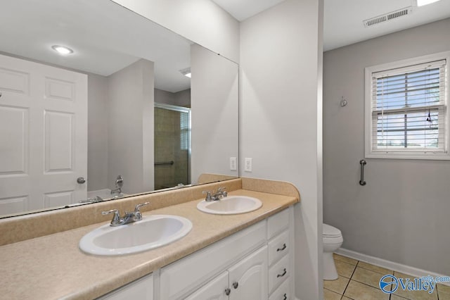 26560 Mill Creek Dr, Athens, AL 35613 - bathroom featuring a shower stall, tile patterned floors, visible vents, and a sink