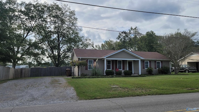 ranch-style house with a front lawn