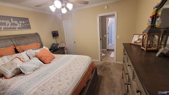 bedroom featuring ornamental molding, ceiling fan, and carpet flooring