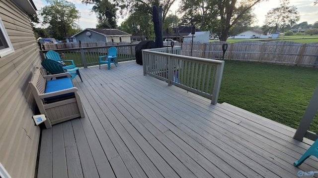 deck featuring a lawn