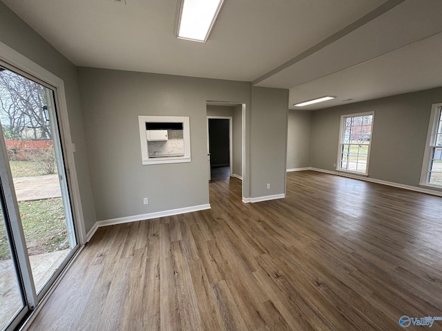 unfurnished room featuring wood-type flooring