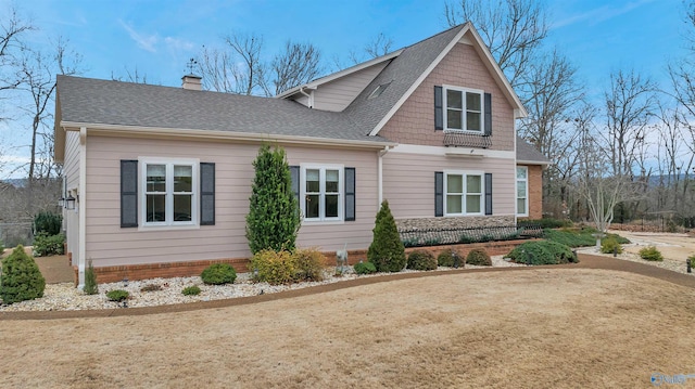 exterior space featuring a front lawn