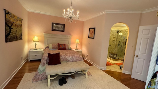 bedroom featuring dark wood-type flooring, crown molding, and a notable chandelier