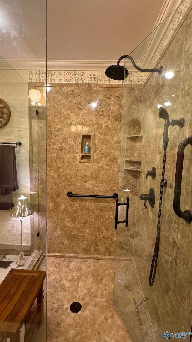 bathroom with a tile shower