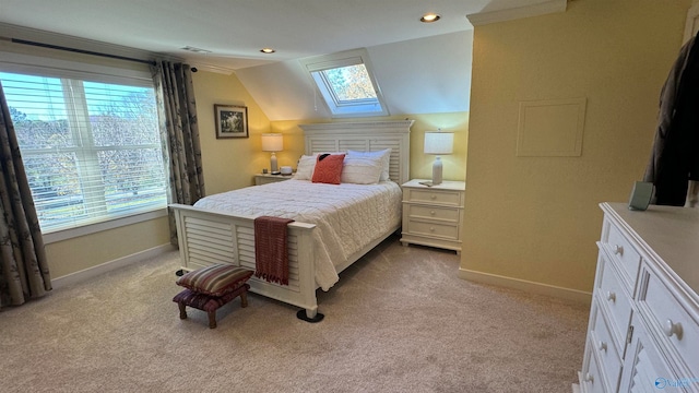 bedroom with lofted ceiling and light carpet