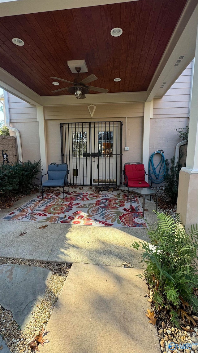 view of patio featuring ceiling fan