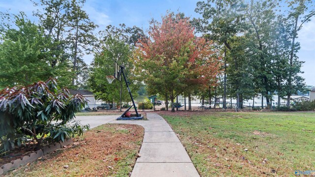 view of home's community featuring a yard