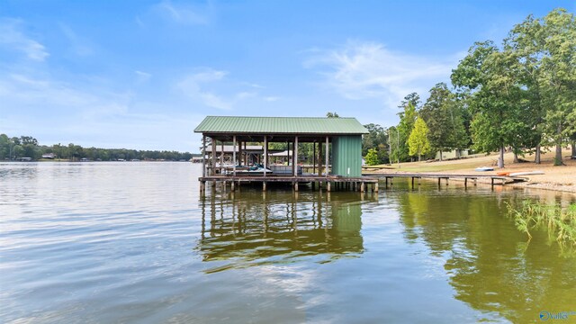 dock area featuring a water view