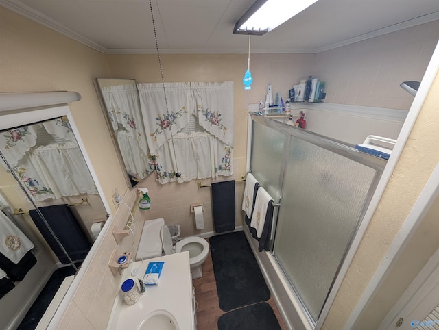 1350 W US Highway 278 W, Cullman, AL 35057 - full bath featuring crown molding, toilet, tile walls, wood finished floors, and a stall shower