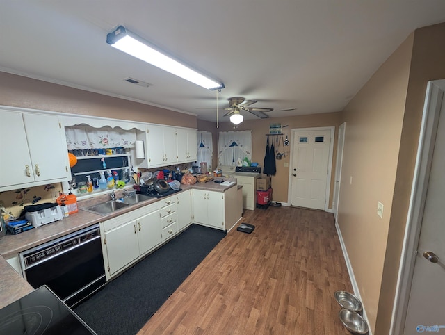 1350 W US Highway 278 W, Cullman, AL 35057 - kitchen with visible vents, black dishwasher, dark wood-style floors, white cabinetry, and a sink