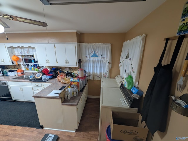1350 W US Highway 278 W, Cullman, AL 35057 - kitchen with a sink, white cabinetry, black dishwasher, and washing machine and clothes dryer