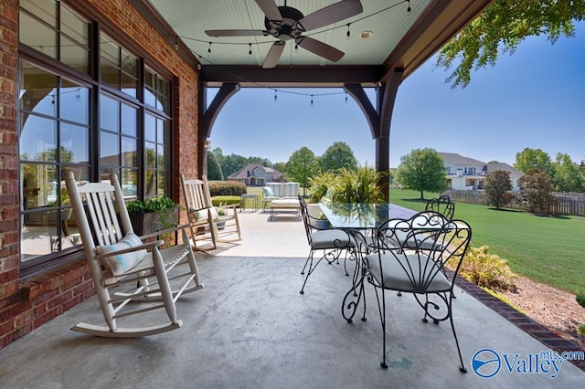 view of patio featuring ceiling fan