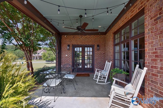 view of patio / terrace with ceiling fan and french doors