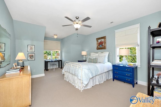 bedroom with ceiling fan and light colored carpet