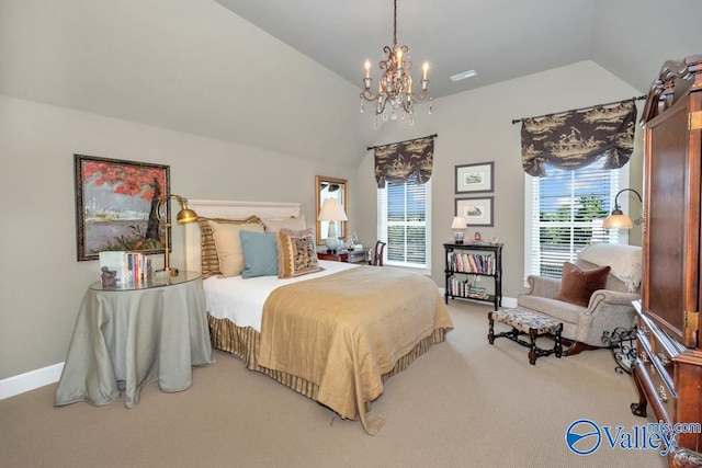 carpeted bedroom featuring an inviting chandelier and vaulted ceiling