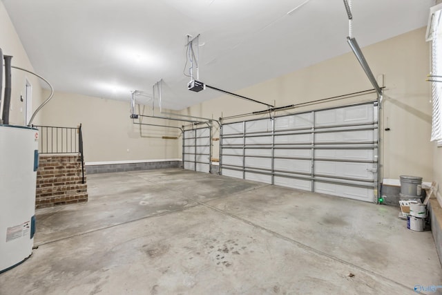 4513 Stone Park Cir, Owens Cross Roads, AL 35763 - garage featuring water heater and a garage door opener