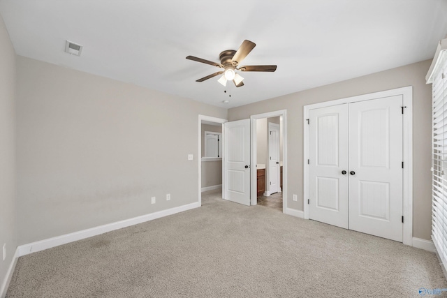 4513 Stone Park Cir, Owens Cross Roads, AL 35763 - unfurnished bedroom featuring light colored carpet, a closet, connected bathroom, and a ceiling fan