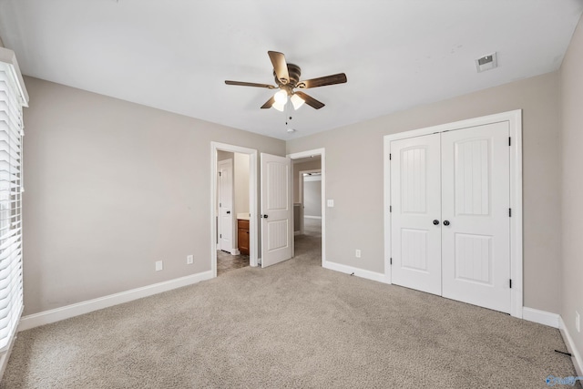 4513 Stone Park Cir, Owens Cross Roads, AL 35763 - unfurnished bedroom with light colored carpet, a closet, ensuite bathroom, and ceiling fan