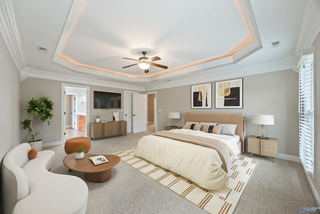 4513 Stone Park Cir, Owens Cross Roads, AL 35763 - bedroom featuring a raised ceiling, ornamental molding, light colored carpet, and a ceiling fan
