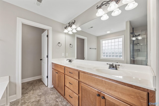 4513 Stone Park Cir, Owens Cross Roads, AL 35763 - bathroom featuring double vanity and a shower with shower door