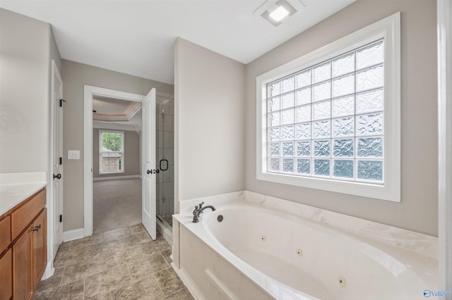 4513 Stone Park Cir, Owens Cross Roads, AL 35763 - bathroom with vanity, a tub with jets, and a stall shower