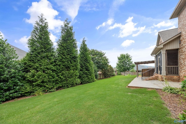 4513 Stone Park Cir, Owens Cross Roads, AL 35763 - fenced backyard with a patio area