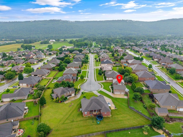 4513 Stone Park Cir, Owens Cross Roads, AL 35763 - aerial view of property and surrounding area with nearby suburban area and a mountain backdrop