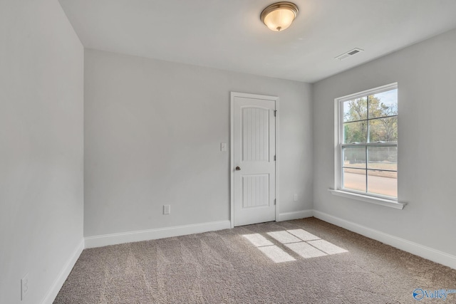 unfurnished room featuring carpet floors