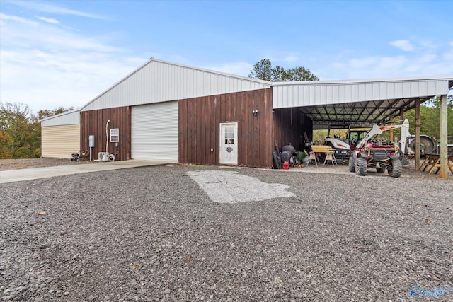 view of outbuilding with a garage