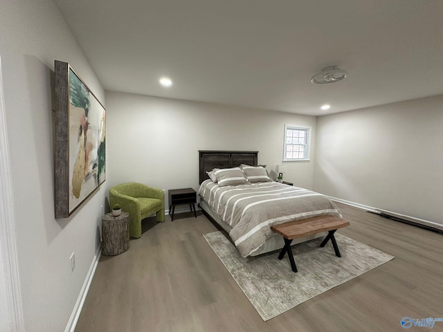 bedroom featuring wood-type flooring