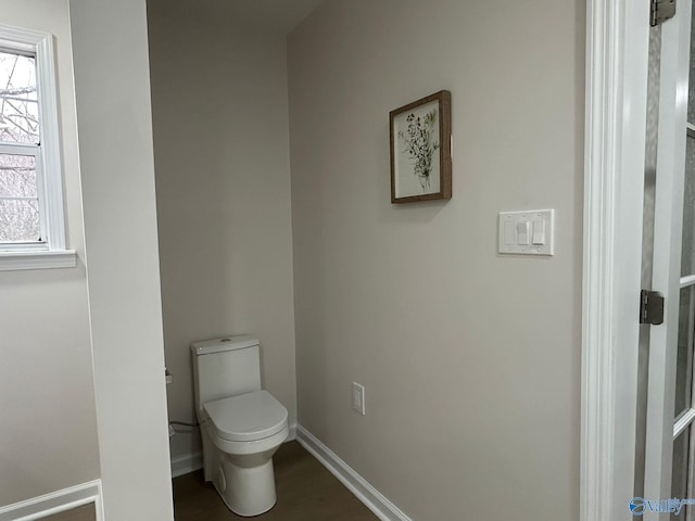 bathroom featuring toilet