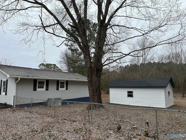 view of property exterior with central AC unit