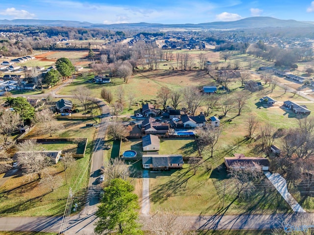 birds eye view of property featuring a mountain view